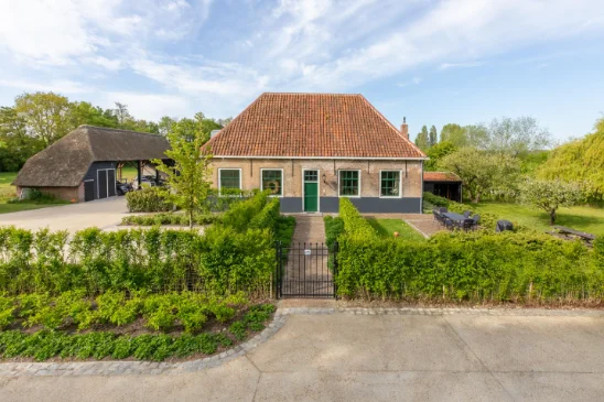 Woonkamer van vakantiehuis Molenhof in Heinkenszand